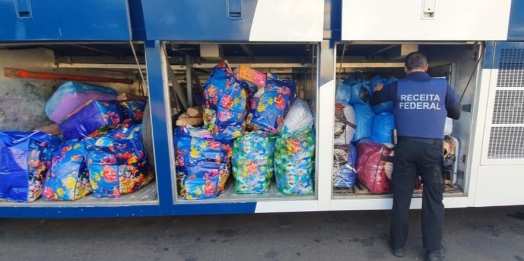 Ônibus carregado de mercadorias descaminhadas é retido na estrada velha de Guarapuava